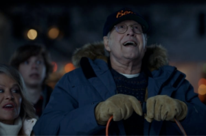 Chevy Chase and Beverly D'Angelo reprise their National Lampoon’s Christmas Vacation roles with Mach-E